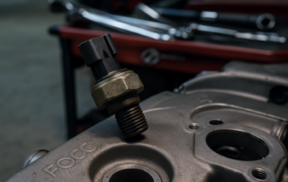 oil pressure sensor removed from a Ford Focus 1.6 TDCi engine block